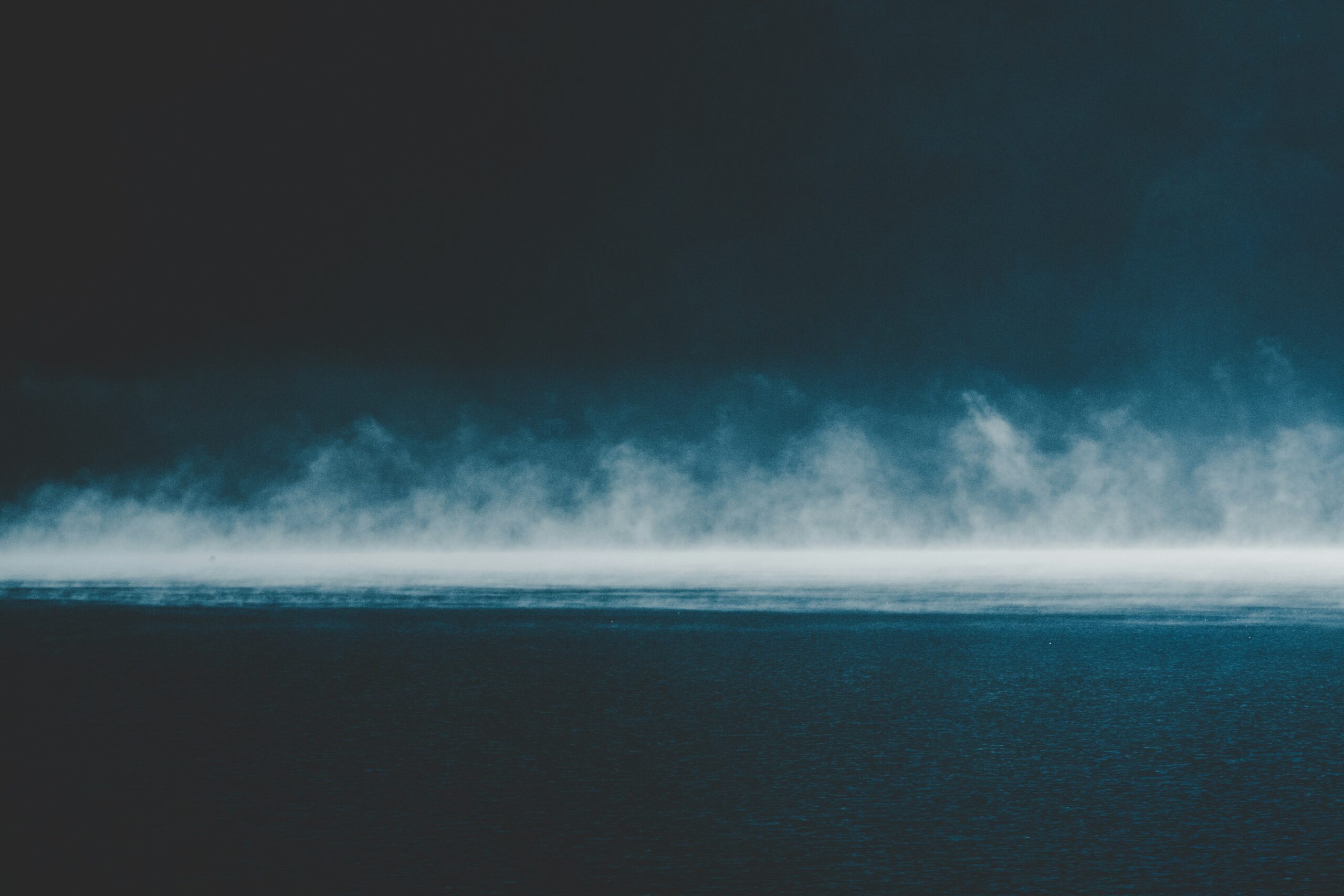 Dark sky and dark water representing mental health trauma