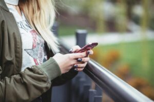 Woman on her phone, distracted from life and connecting with others