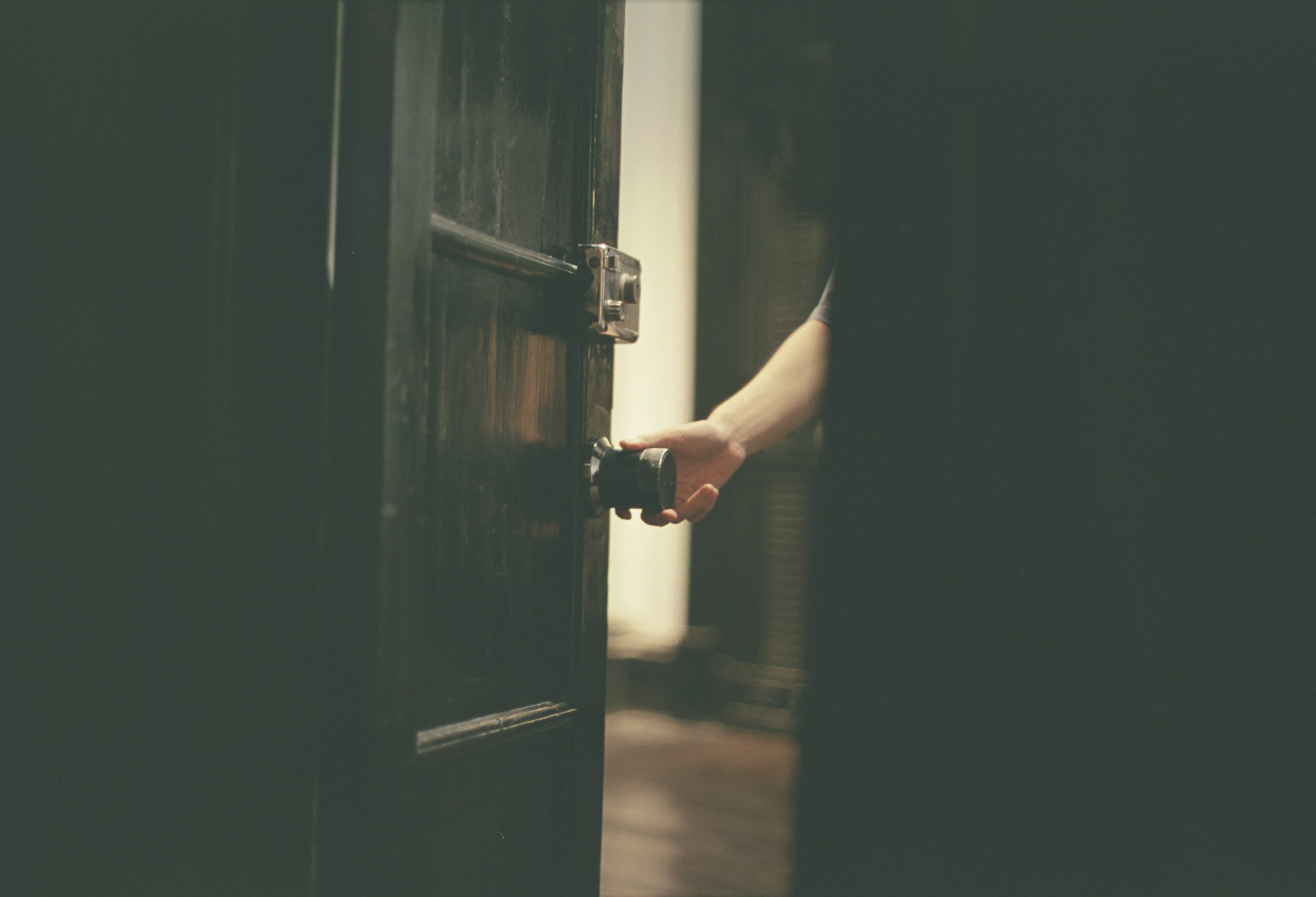 hand touching doorknob during ERP therapy