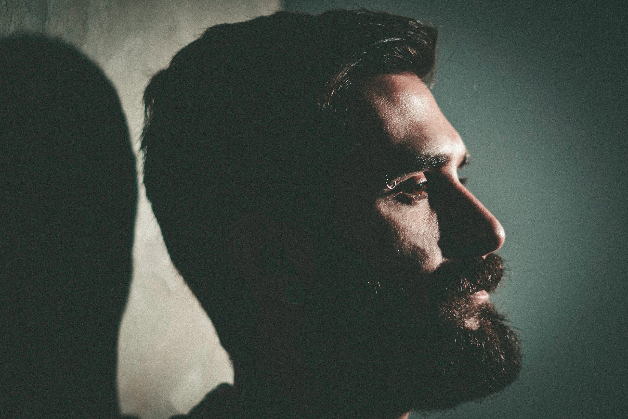 Profile of a man with a beard